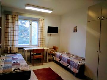 Фото номера Двухместный номер с 2 отдельными кроватями Хостелы Hostel Vanha Koulu г. Monola 2
