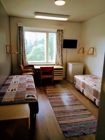 Фото номера Двухместный номер с 2 отдельными кроватями Хостелы Hostel Vanha Koulu г. Monola 7